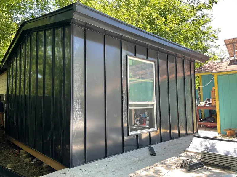 Black standing seam metal wall panels for Roof Inspection in Eagle Pass